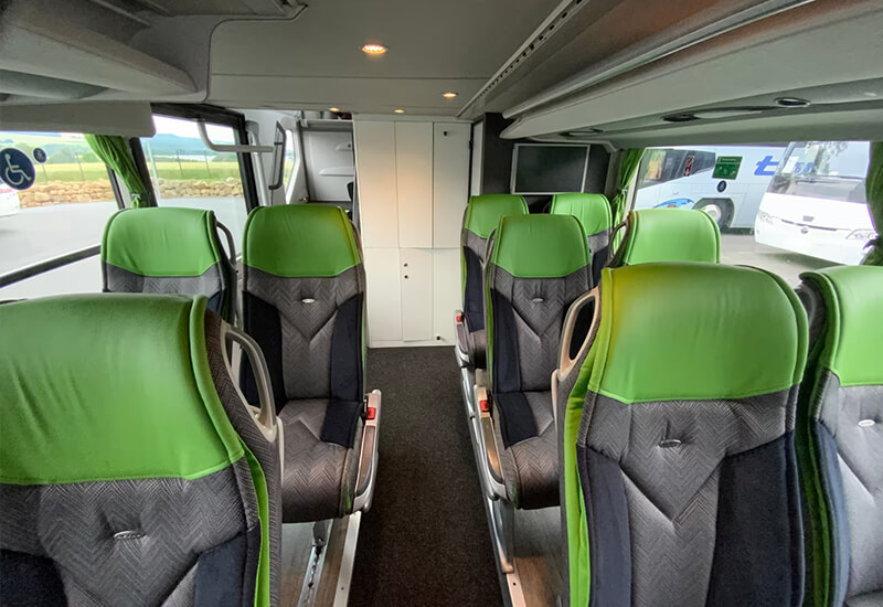Setra double-deck coach cabin with green and gray seats